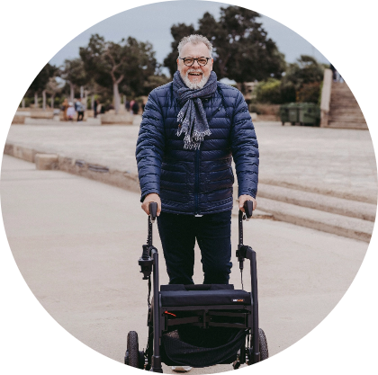 smiling man with walker